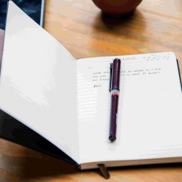 Notizbuch mit Stift